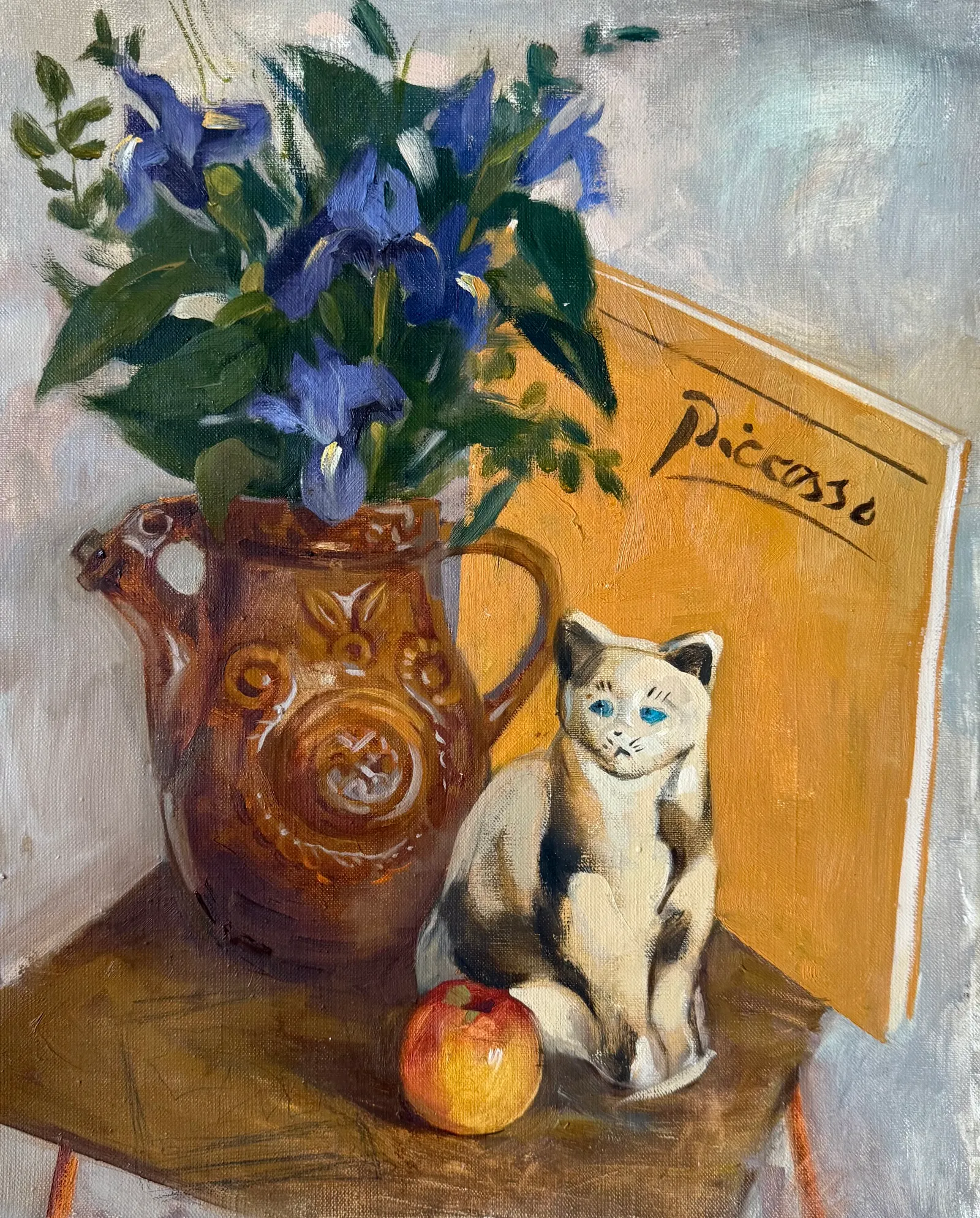 Кошка с ирисами